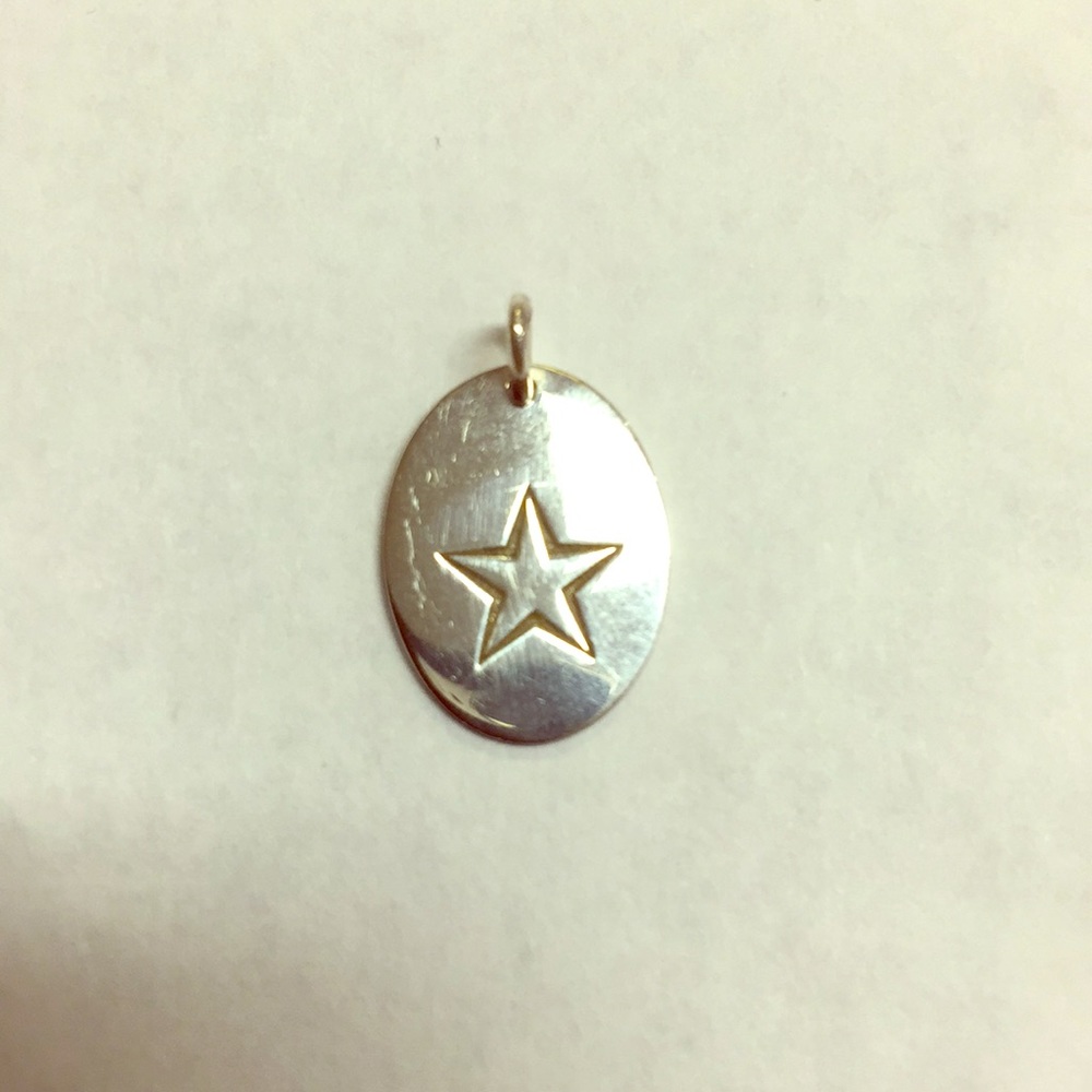 Sterling silver oval star engraved pendent